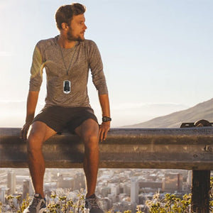  Man wearing the Zacurate 500E Pulse Oximeter with a lanyard around his neck 