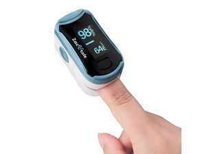 A finger inside of the Zacurate 500G Pulse Oximeter
